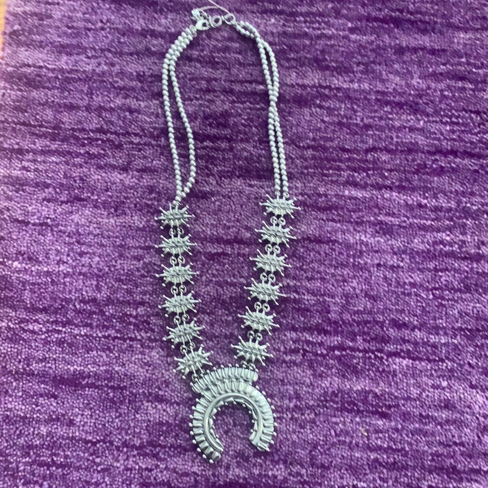 Squash blossom styled necklace